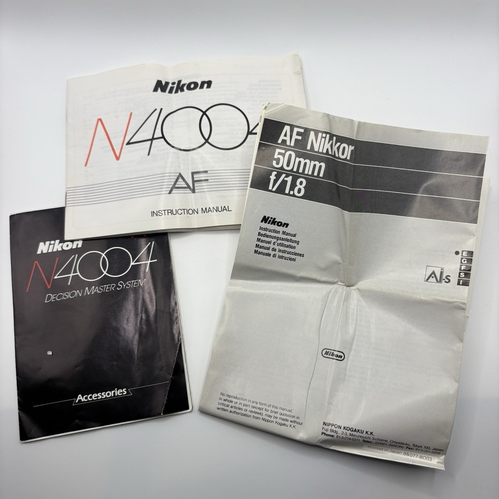 Vintage Nikon N4004 AF 35mm SLR Film Camera Body Only W/ Manuals Bag Powers On - Picture 10 of 14